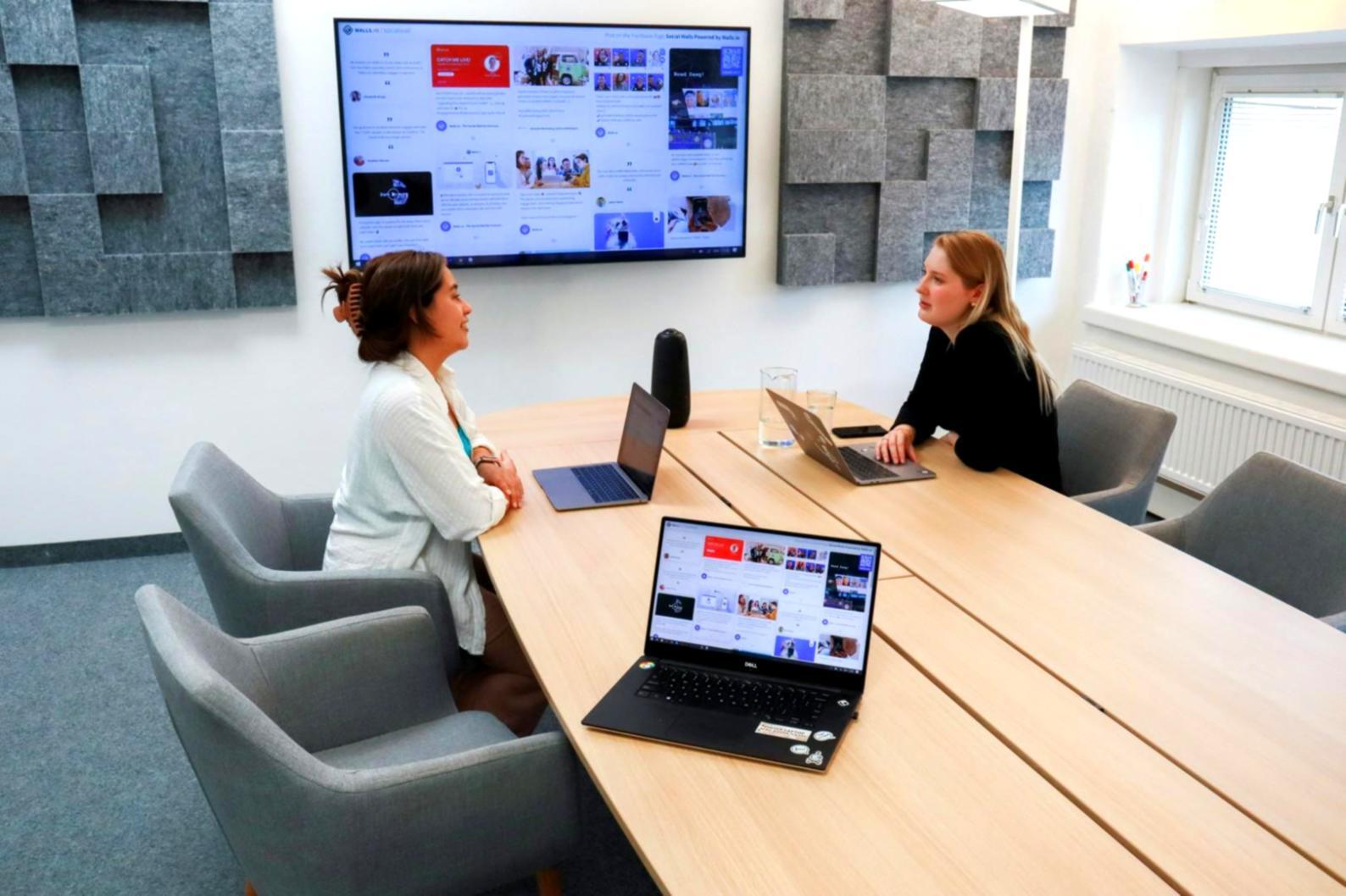 Students learning budgeting techniques in interactive workshop setting